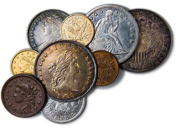 Close-up image of coins with a shallow depth of field.  Coins that were pulled out of savings account or inheritance because of economic hardship.  Variance of silver, cold, copper currency from different countries.